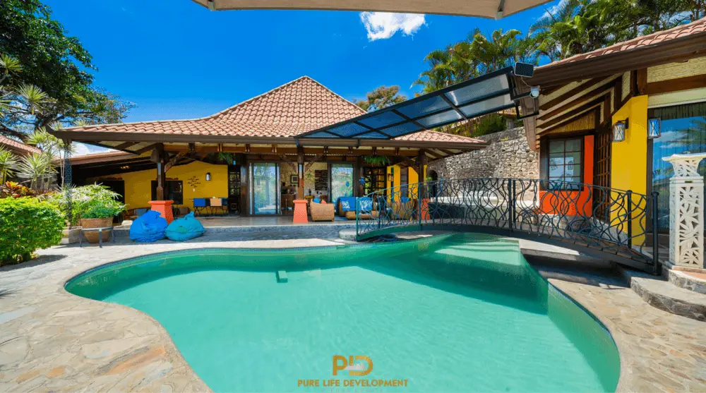 Tropical villa with pool and bridge