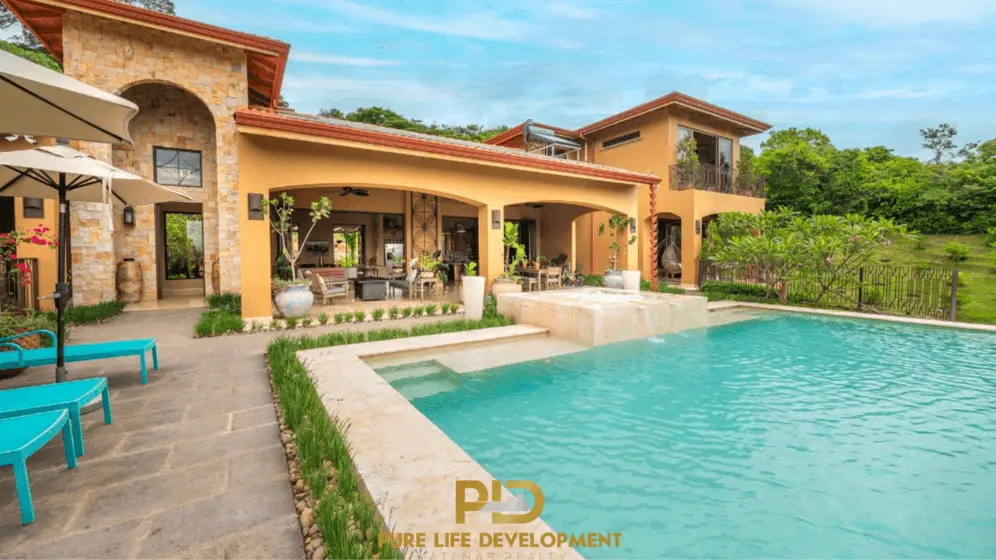 Luxury home with pool and patio area.