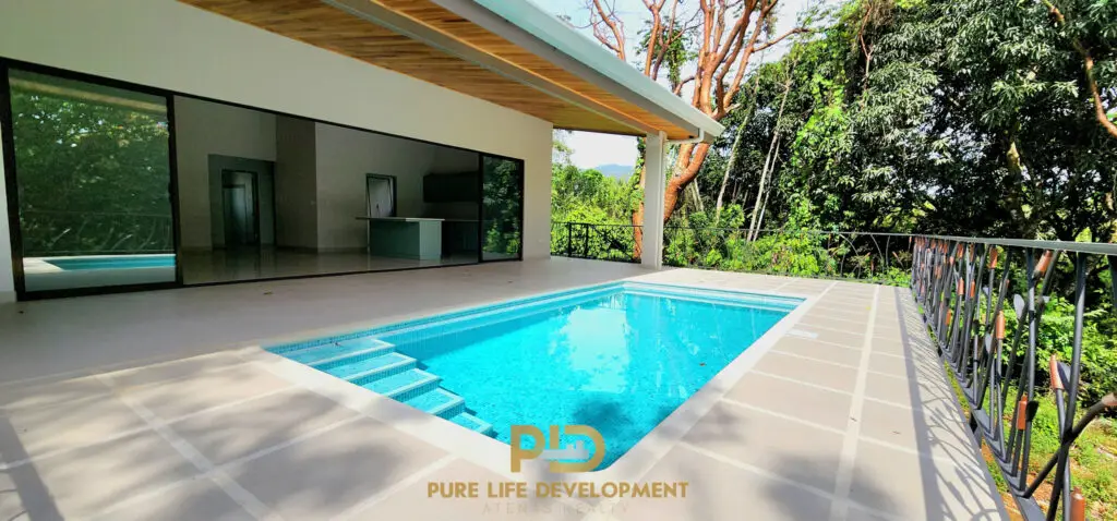 Modern house with pool and forest view in Barrio Mercedes, Atenas, Costa Rica.