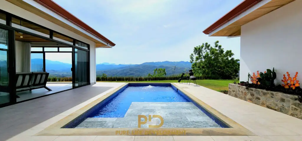 Modern home with pool and mountain view.