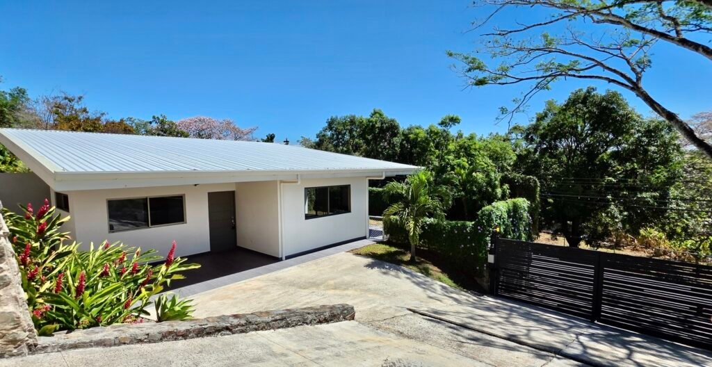 Modern house with garden and gate