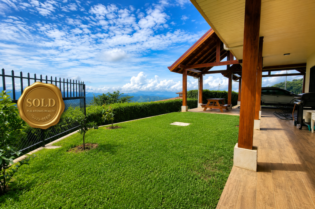 Mountain-view backyard with covered patio and lawn