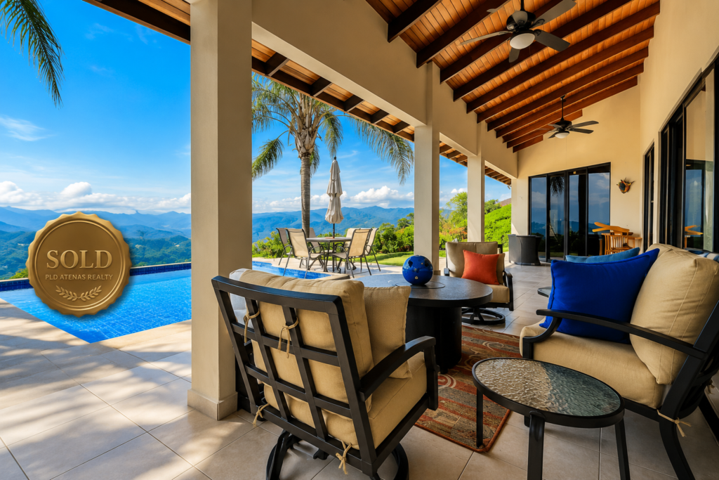 Luxury mountain-view patio with infinity pool, sold badge