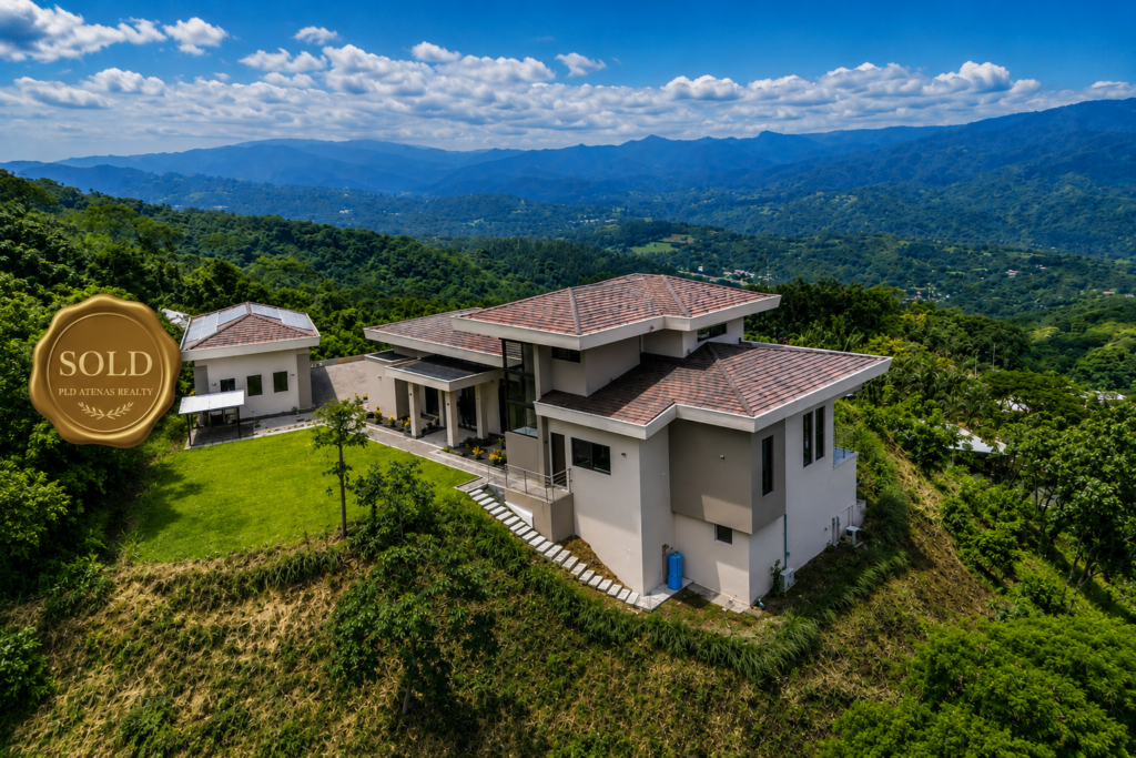 Modern hillside home with mountain views, sold