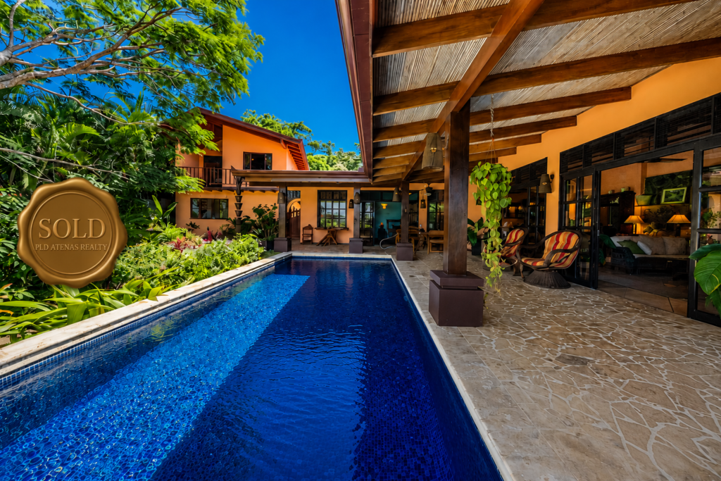 Luxury tropical home with pool and covered patio